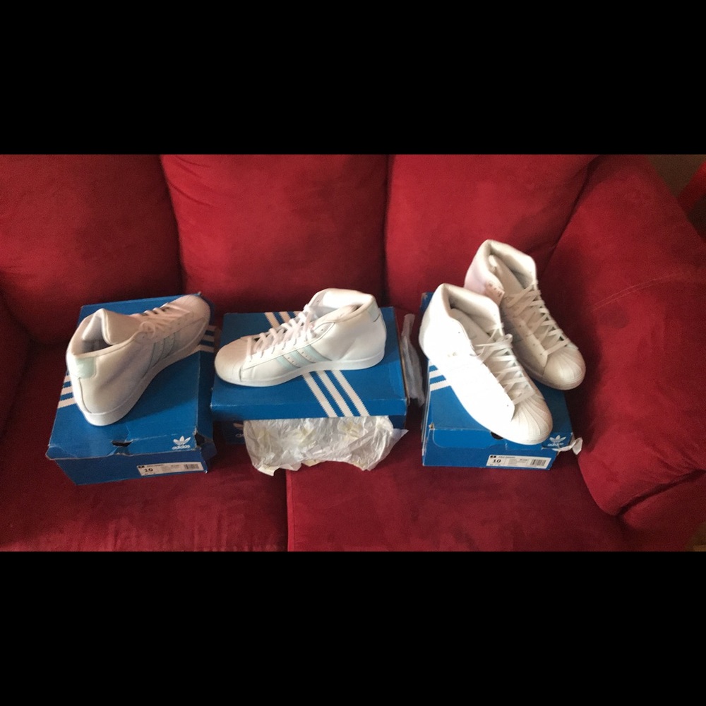 White and blue  hightop adidas